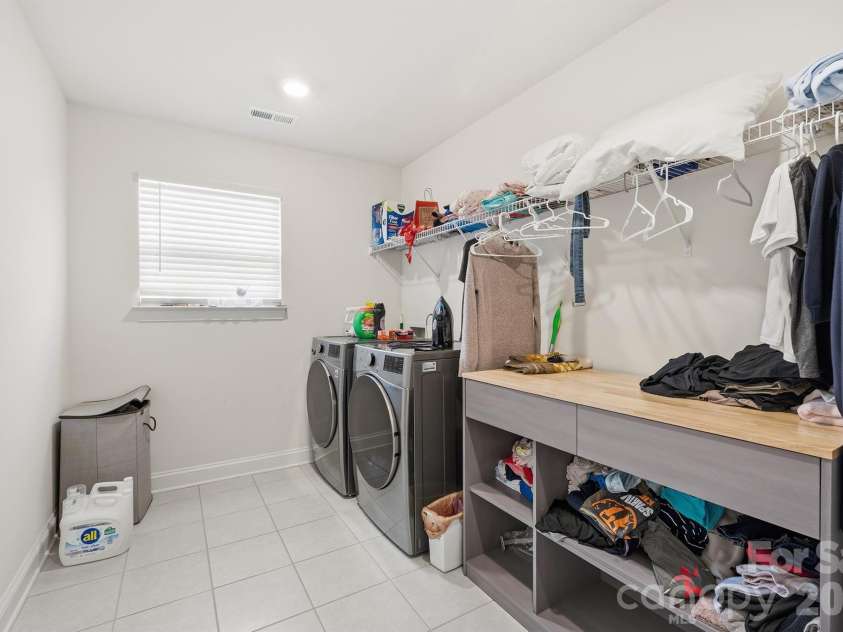 282 Bouchard Drive, Waxhaw, NC 28173.  MLS# CAR4387883, YatesRealty ID 28465. Upstairs Laundry