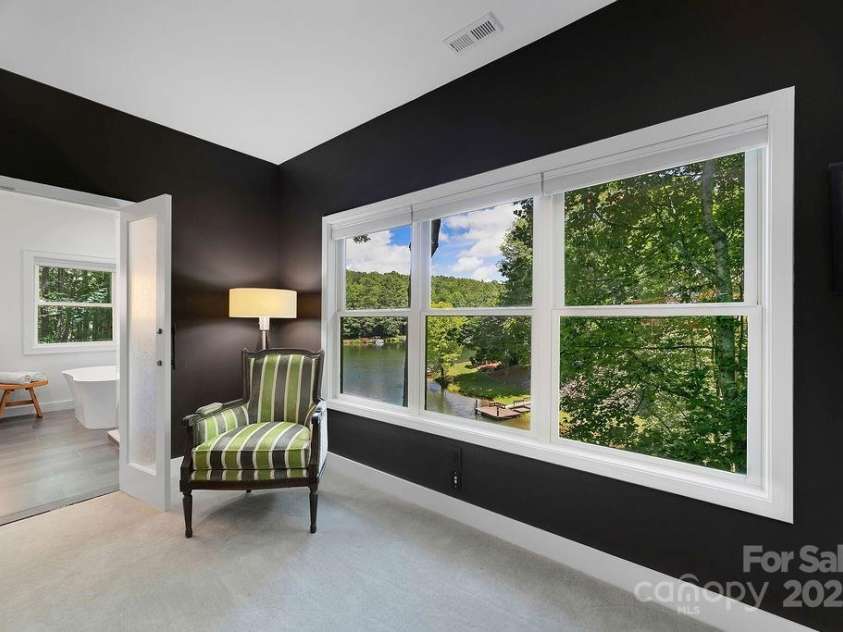 66 Ottaray Court, Brevard, NC 28712.  MLS# CAR4280807, YatesRealty ID 28466. Amazing lake views from the primary bedroom...