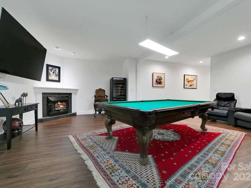 66 Ottaray Court, Brevard, NC 28712.  MLS# CAR4280807, YatesRealty ID 28466. Great spot for theater room, second living room or rec room