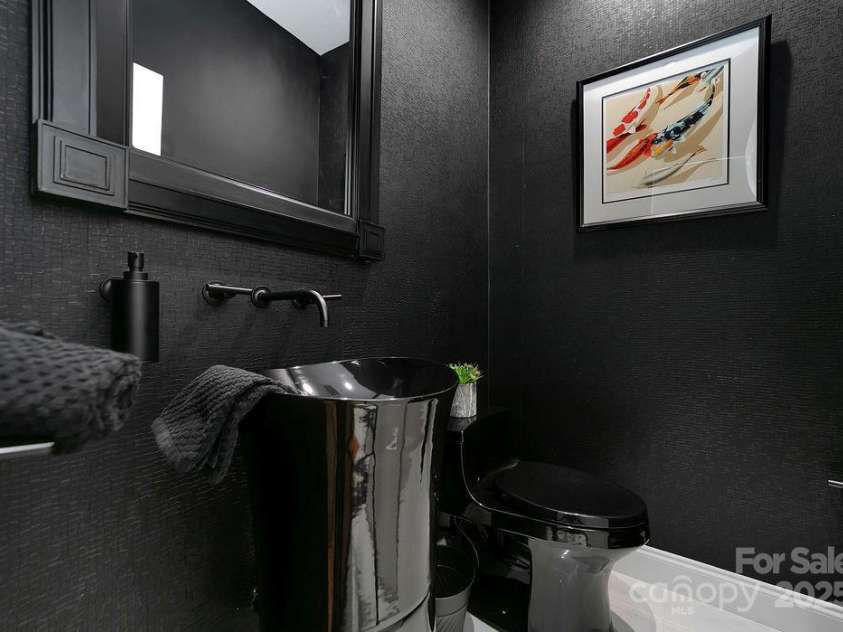 66 Ottaray Court, Brevard, NC 28712.  MLS# CAR4280807, YatesRealty ID 28466. Half bath in stunning charcoal hues