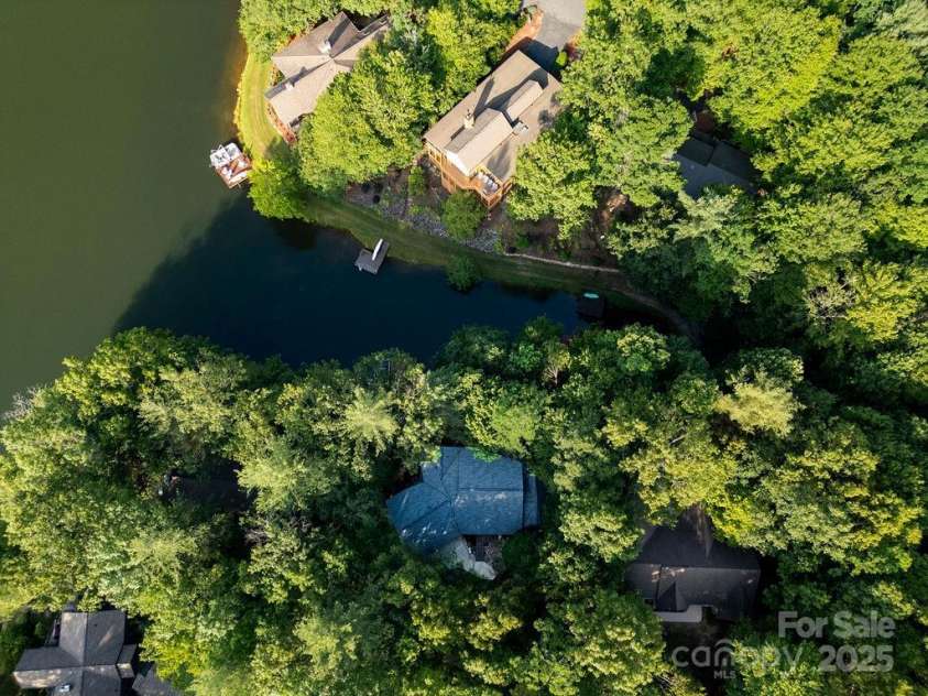 66 Ottaray Court, Brevard, NC 28712.  MLS# CAR4280807, YatesRealty ID 28466. Home is surrounded by water & nature...