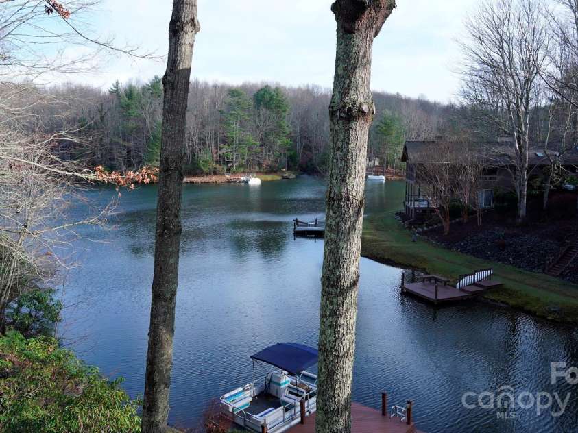 66 Ottaray Court, Brevard, NC 28712.  MLS# CAR4280807, YatesRealty ID 28466. Life is better by the lake!