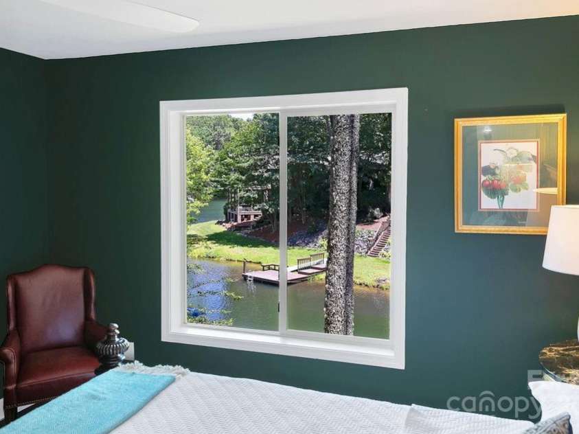 66 Ottaray Court, Brevard, NC 28712.  MLS# CAR4280807, YatesRealty ID 28466. Stunning lake views from guest room bed...