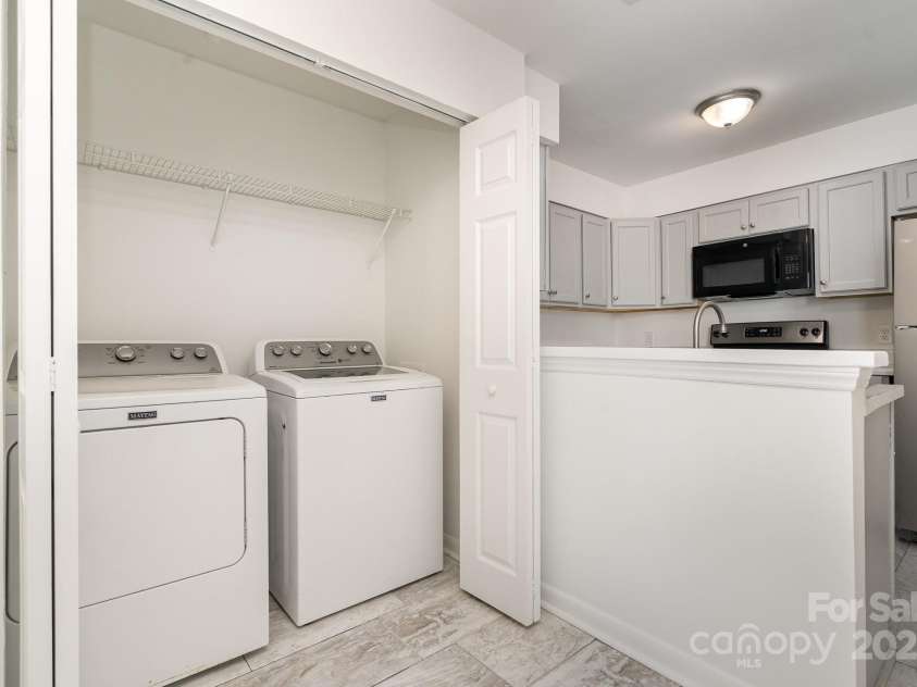 4900 Spring Lake Drive, Charlotte, NC 28212.  MLS# CAR4284345, YatesRealty ID 28468. Laundry Area