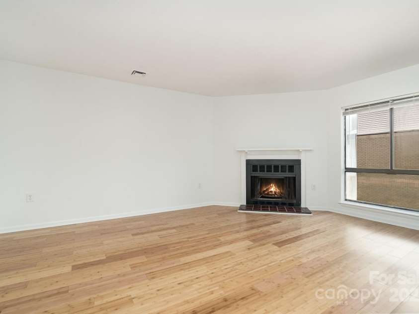 4900 Spring Lake Drive, Charlotte, NC 28212.  MLS# CAR4284345, YatesRealty ID 28468. Living Area- Fireplace