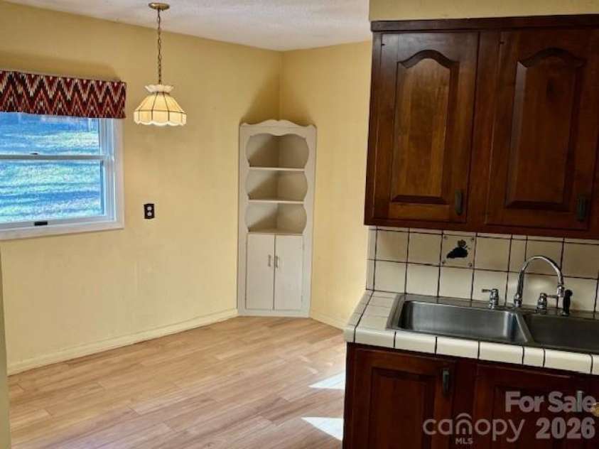 30 Brier Lane, Maggie Valley, NC 28751.  MLS# CAR4320298, YatesRealty ID 2847. Breakfast area in kitchen