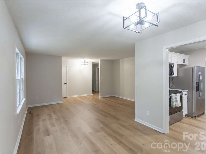 1880 Woodridge Circle, Hickory, NC 28602.  MLS# CAR4389605, YatesRealty ID 28477. Front living/dining room