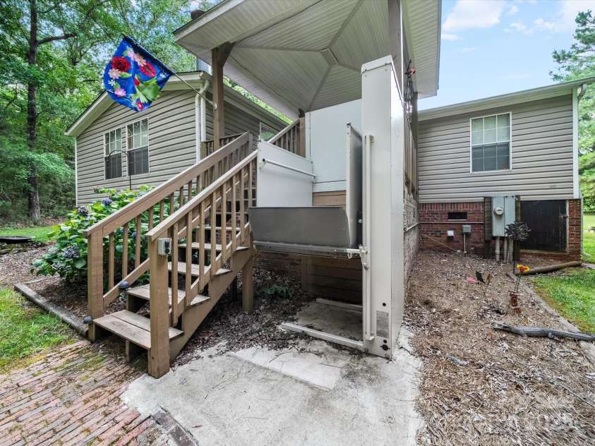 3911 Doster Road, Monroe, NC 28112.  MLS# CAR4277789, YatesRealty ID 28478. Elevator off deck