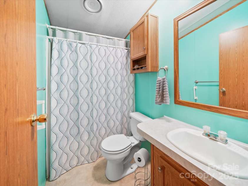 3911 Doster Road, Monroe, NC 28112.  MLS# CAR4277789, YatesRealty ID 28478. Hall Bath