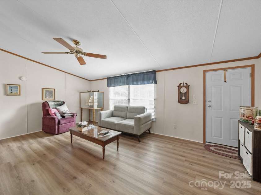 3911 Doster Road, Monroe, NC 28112.  MLS# CAR4277789, YatesRealty ID 28478. Living room