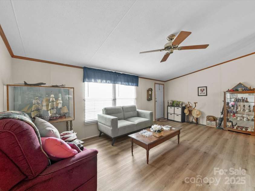 3911 Doster Road, Monroe, NC 28112.  MLS# CAR4277789, YatesRealty ID 28478. Living Room