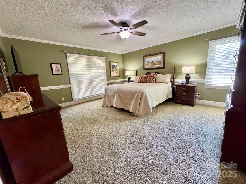 271 Ikerd Drive, Concord, NC 28025.  MLS# CAR4245802, YatesRealty ID 28479. Primary bedroom with his and hers walk-in closets