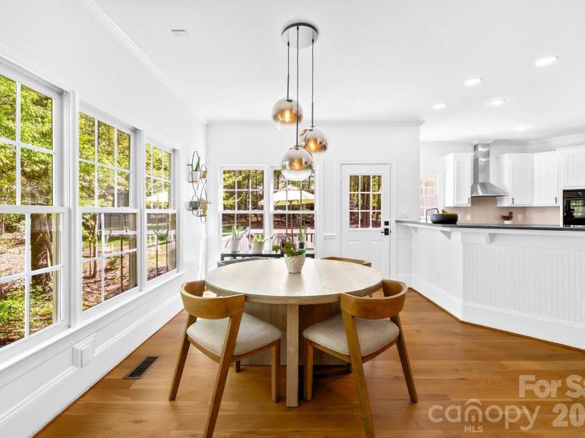 8830 Bluestone Bay Court, Sherrills Ford, NC 28673.  MLS# CAR4362006, YatesRealty ID 28484. Kitchen dining space with so much light.