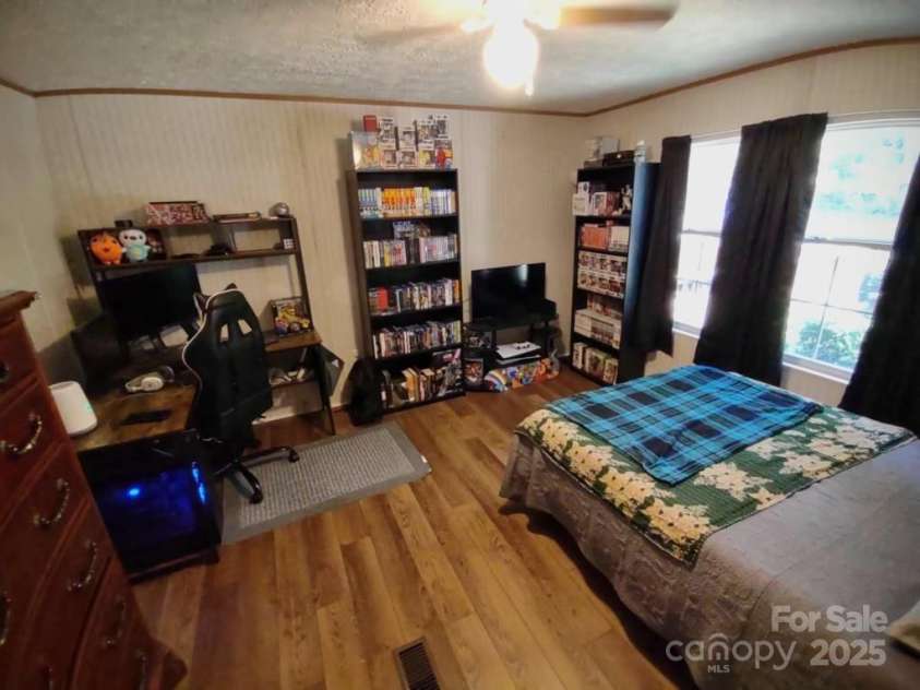 176 Hunters Glen Road, Troy, NC 27371.  MLS# CAR4281871, YatesRealty ID 28488. Bedroom 1