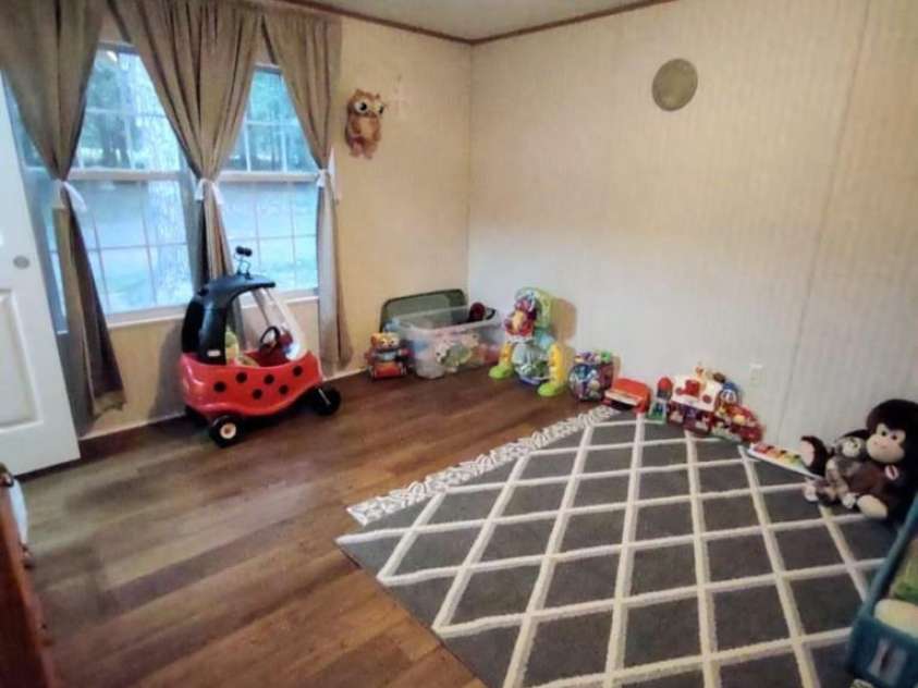 176 Hunters Glen Road, Troy, NC 27371.  MLS# CAR4281871, YatesRealty ID 28488. Bedroom 2