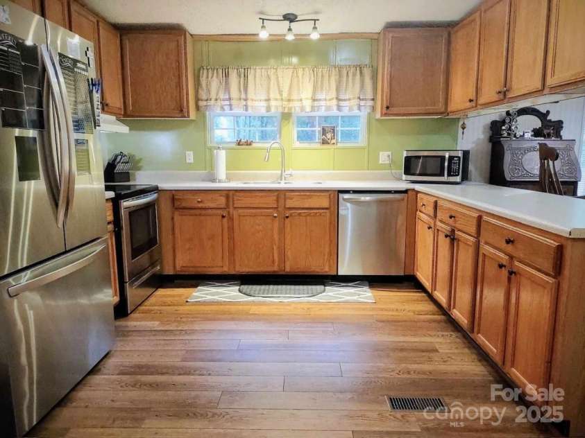 176 Hunters Glen Road, Troy, NC 27371.  MLS# CAR4281871, YatesRealty ID 28488. Kitchen