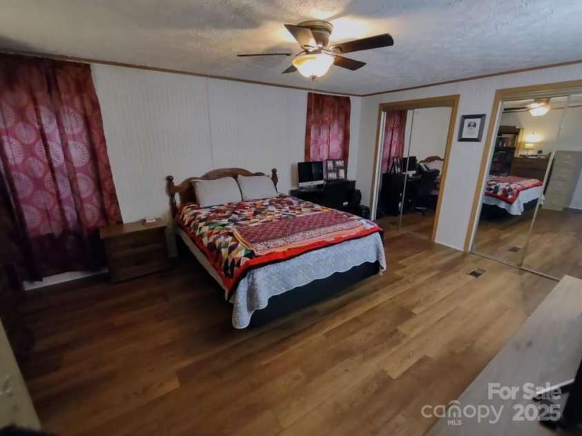 176 Hunters Glen Road, Troy, NC 27371.  MLS# CAR4281871, YatesRealty ID 28488. Primary bedroom