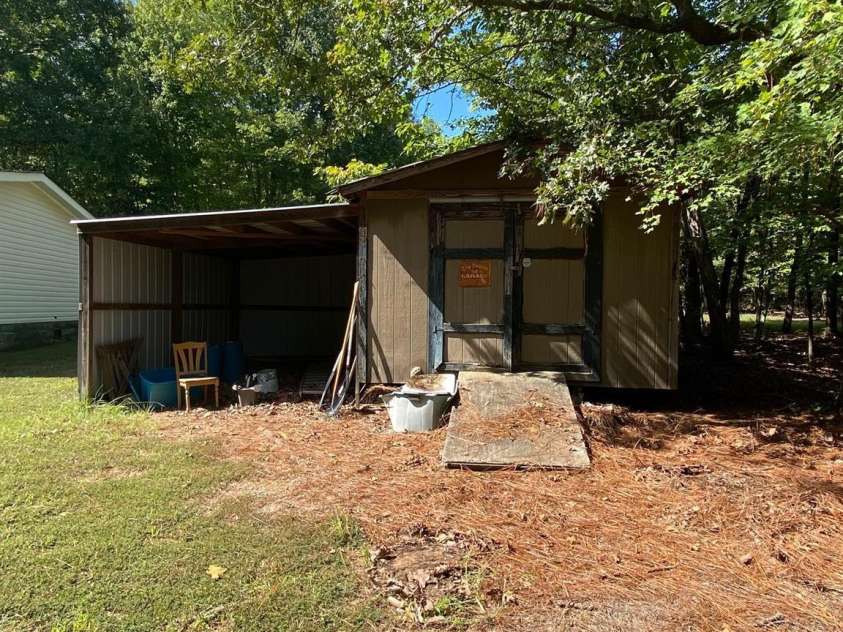 176 Hunters Glen Road, Troy, NC 27371.  MLS# CAR4281871, YatesRealty ID 28488. Shed