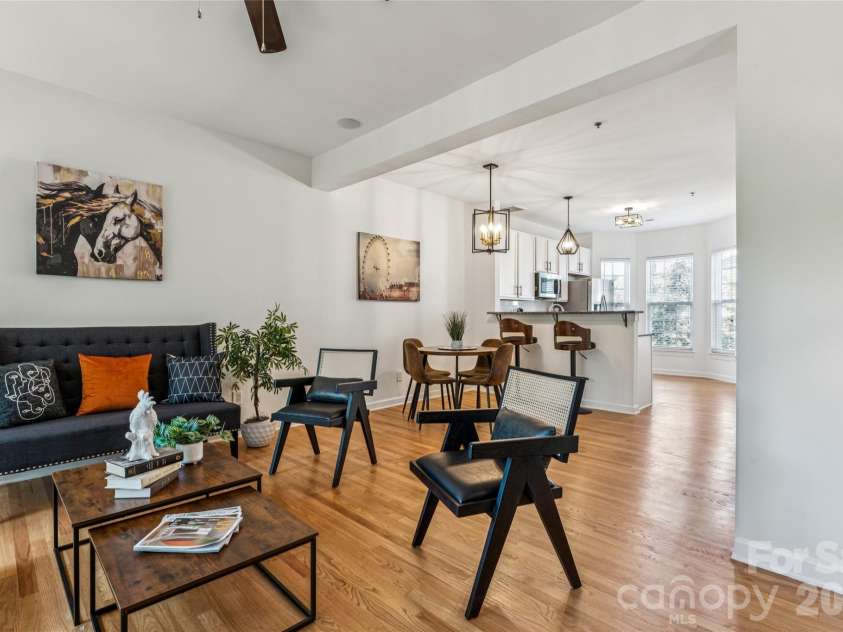 6333 Royal Celadon Way, Charlotte, NC 28269.  MLS# CAR4385329, YatesRealty ID 28493. The property boasts an inviting open floorplan, providing ample and versatile space perfect for hosting large gatherings of friends and family. The expansive layout encourages seamless interaction and comfortable mo
