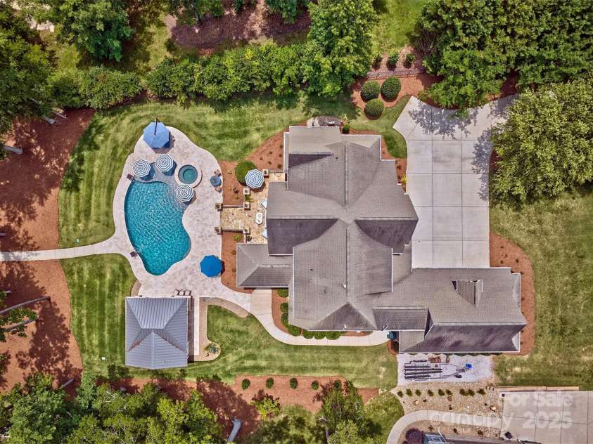 6216 North Road, York, SC 29745.  MLS# CAR4270896, YatesRealty ID 28499. Aerial view of home and pool