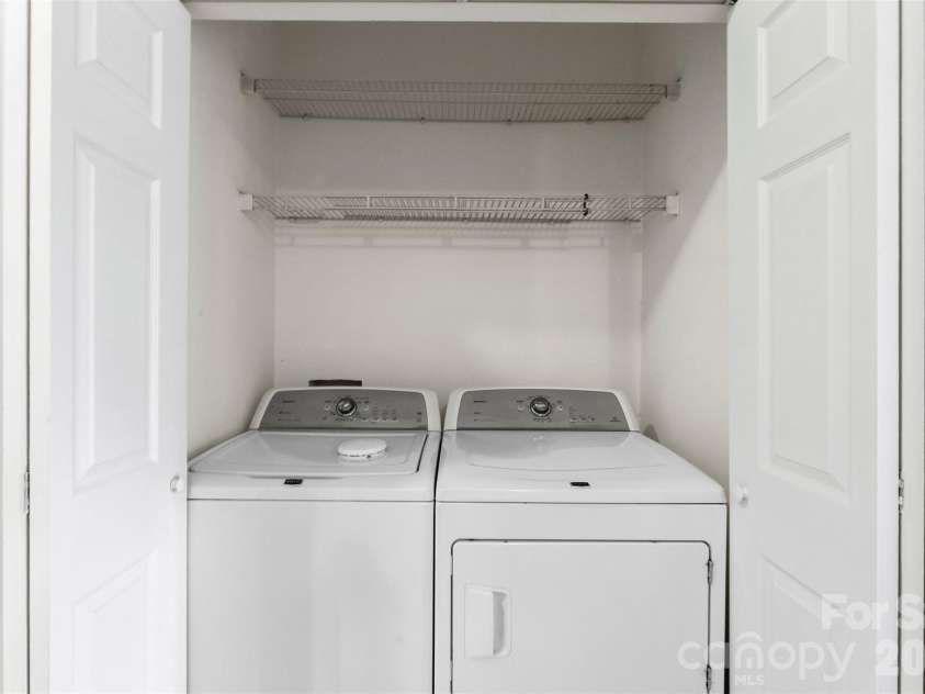 6953 Misty Pine Lane, Charlotte, NC 28217.  MLS# CAR4384306, YatesRealty ID 28499. Laundry Closet