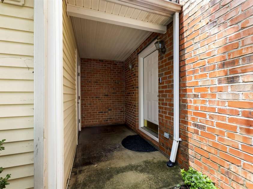 6953 Misty Pine Lane, Charlotte, NC 28217.  MLS# CAR4384306, YatesRealty ID 28499. Porch 