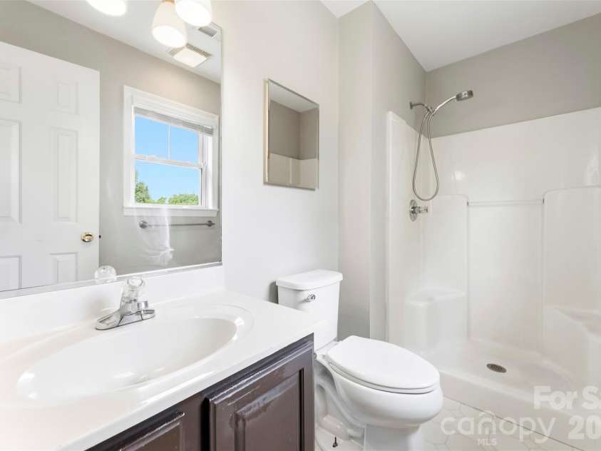 6953 Misty Pine Lane, Charlotte, NC 28217.  MLS# CAR4384306, YatesRealty ID 28499. Primary Bathroom