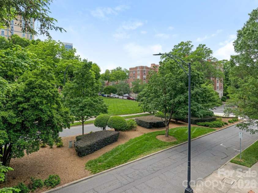 212 10th Street, Charlotte, NC 28202.  MLS# CAR4394129, YatesRealty ID 285. Western view over the tree canopy of Fourth Ward