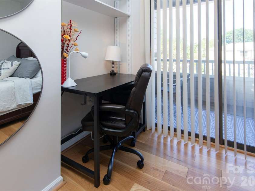 212 10th Street, Charlotte, NC 28202.  MLS# CAR4413530, YatesRealty ID 285. Bedroom with work space
