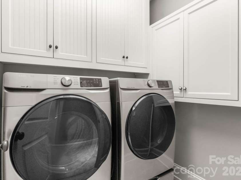 129 Marstons Mill Drive, Mooresville, NC 28117.  MLS# CAR4387491, YatesRealty ID 28501. Upstairs laundry
