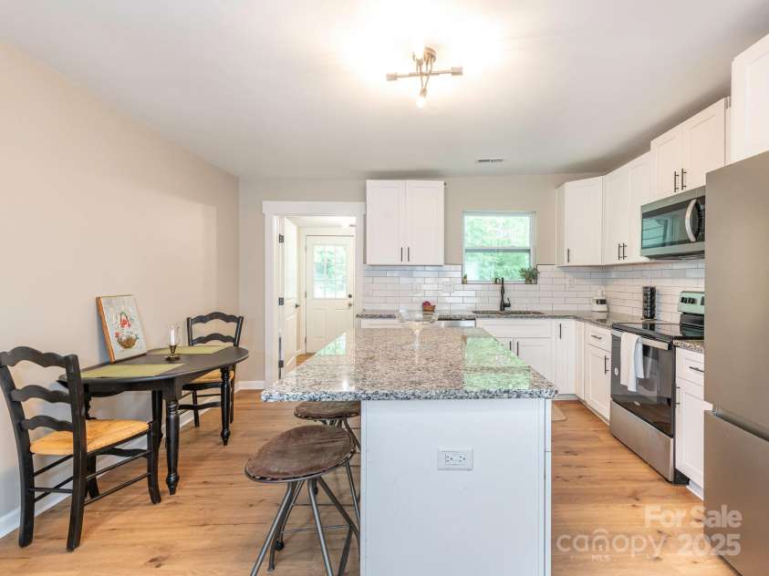 803 13th Street, Kannapolis, NC 28083.  MLS# CAR4244257, YatesRealty ID 28501. Kitchen & Dining