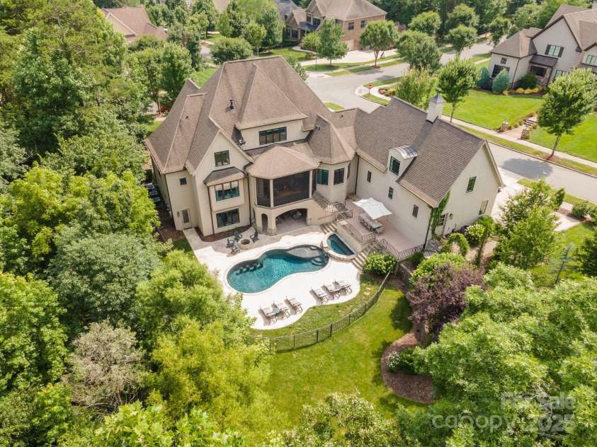 15603 June Washam Road, Davidson, NC 28036.  MLS# CAR4273381, YatesRealty ID 28502. Backyard oasis is perfect for relaxation and entertaining