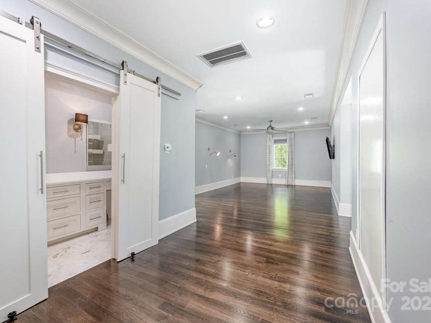 15603 June Washam Road, Davidson, NC 28036.  MLS# CAR4273381, YatesRealty ID 28502. Bedroom over garage.  Super space for nanny or in-laws