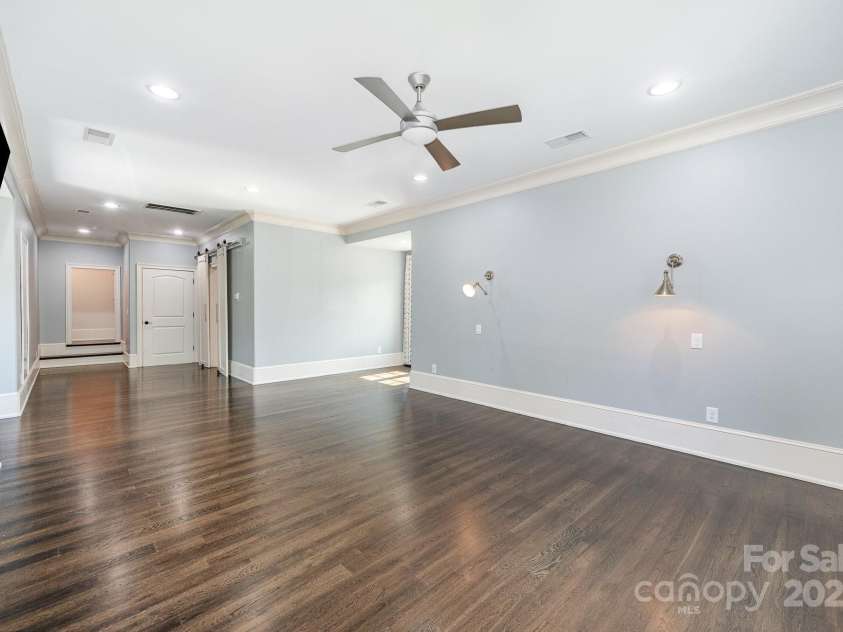 15603 June Washam Road, Davidson, NC 28036.  MLS# CAR4273381, YatesRealty ID 28502. Bedroom/Rec room over garage with full bath.  