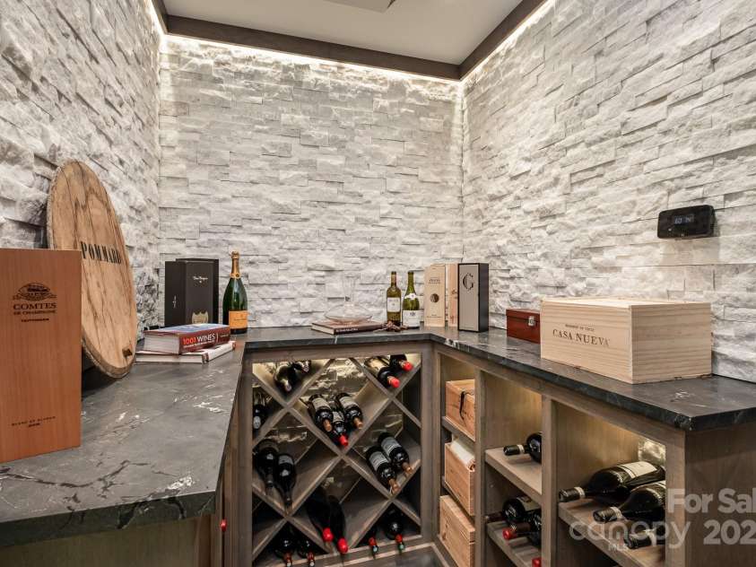 15603 June Washam Road, Davidson, NC 28036.  MLS# CAR4273381, YatesRealty ID 28502. Display and more storage in the Wine Cellar