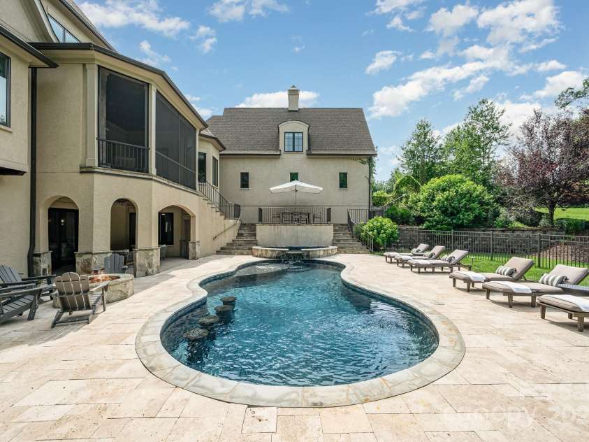 15603 June Washam Road, Davidson, NC 28036.  MLS# CAR4273381, YatesRealty ID 28502. Firepit for cool nights.