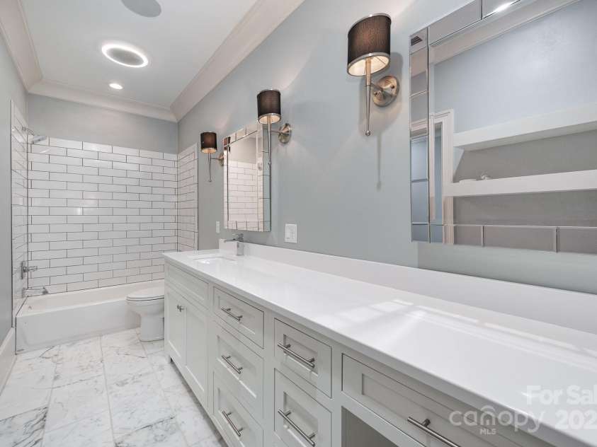 15603 June Washam Road, Davidson, NC 28036.  MLS# CAR4273381, YatesRealty ID 28502. Full bath over garage