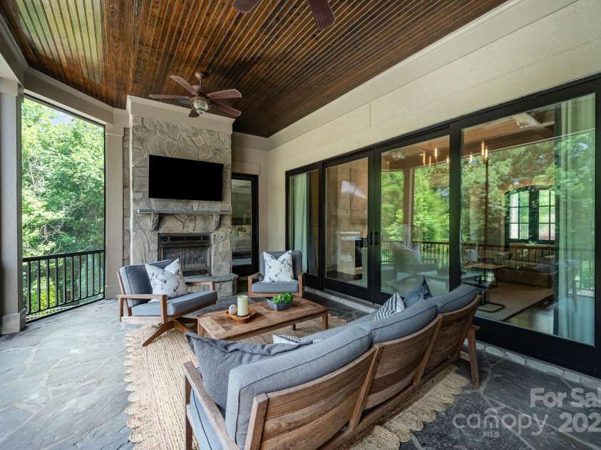 15603 June Washam Road, Davidson, NC 28036.  MLS# CAR4273381, YatesRealty ID 28502. Gas Log Fireplace Main Level Screened Porch