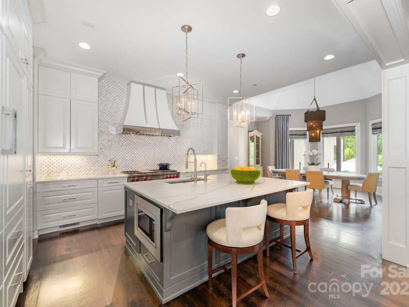 15603 June Washam Road, Davidson, NC 28036.  MLS# CAR4273381, YatesRealty ID 28502. Gourmet Kitchen, Built-in Sub Zero with cabinet fronts.  An entertainers delight in an island.