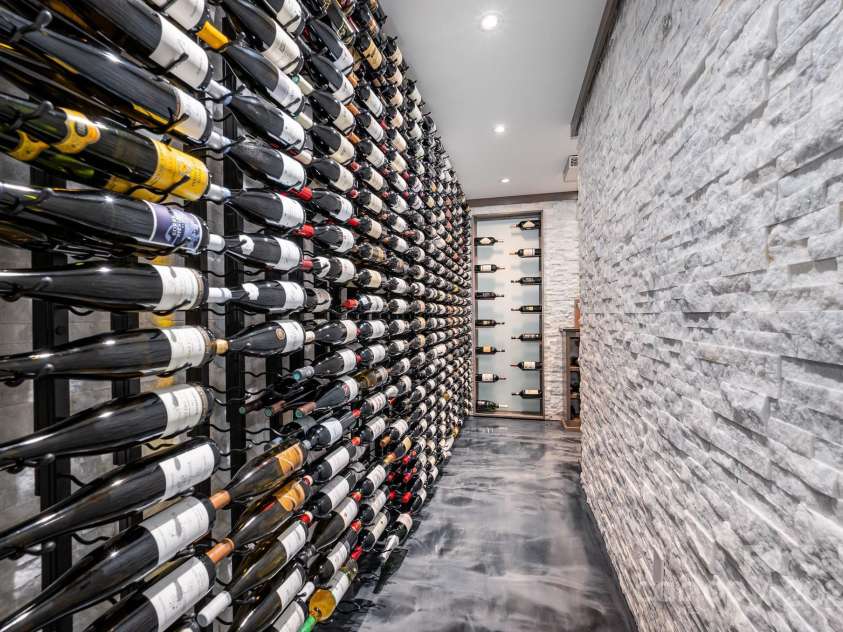 15603 June Washam Road, Davidson, NC 28036.  MLS# CAR4273381, YatesRealty ID 28502. Incredible custom Wine Cellar holding 1000+ bottles.