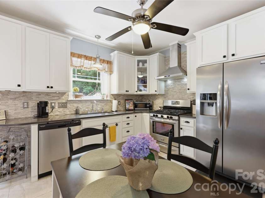 106 Maple Street, Fort Mill, SC 29715.  MLS# CAR4388689, YatesRealty ID 28504. Eating area, with a window overlooking the back.