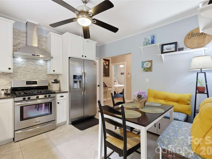 106 Maple Street, Fort Mill, SC 29715.  MLS# CAR4388689, YatesRealty ID 28504. Gas range, undercounter lighting, recessed ceiling lights.
