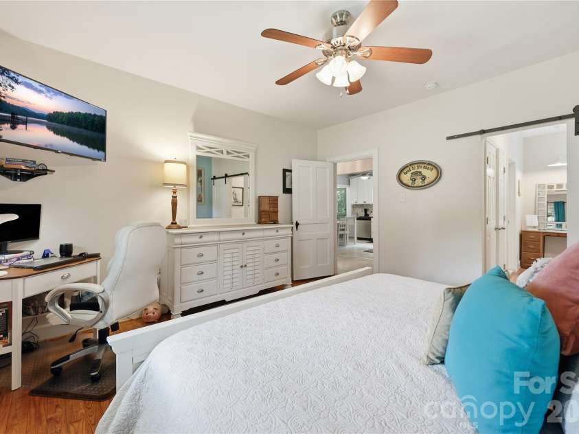 106 Maple Street, Fort Mill, SC 29715.  MLS# CAR4388689, YatesRealty ID 28504. Sliding barn door, for space utilization, opening to the full bath.