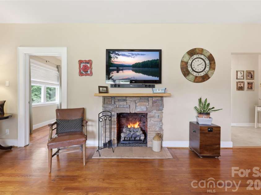 106 Maple Street, Fort Mill, SC 29715.  MLS# CAR4388689, YatesRealty ID 28504. Stone fireplace with gas logs