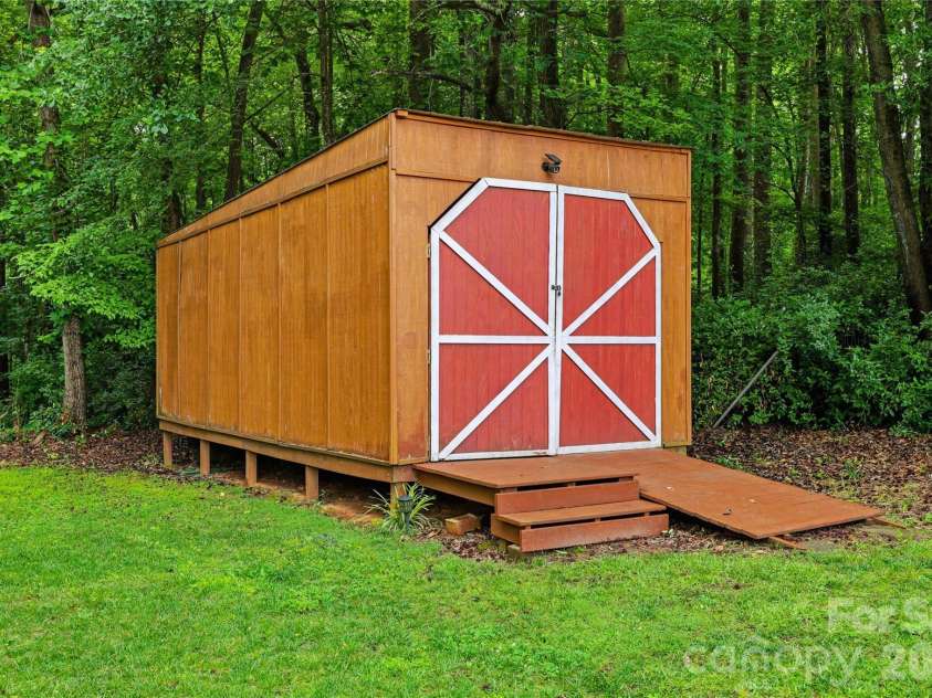 106 Maple Street, Fort Mill, SC 29715.  MLS# CAR4388689, YatesRealty ID 28504. Storage shed remains.