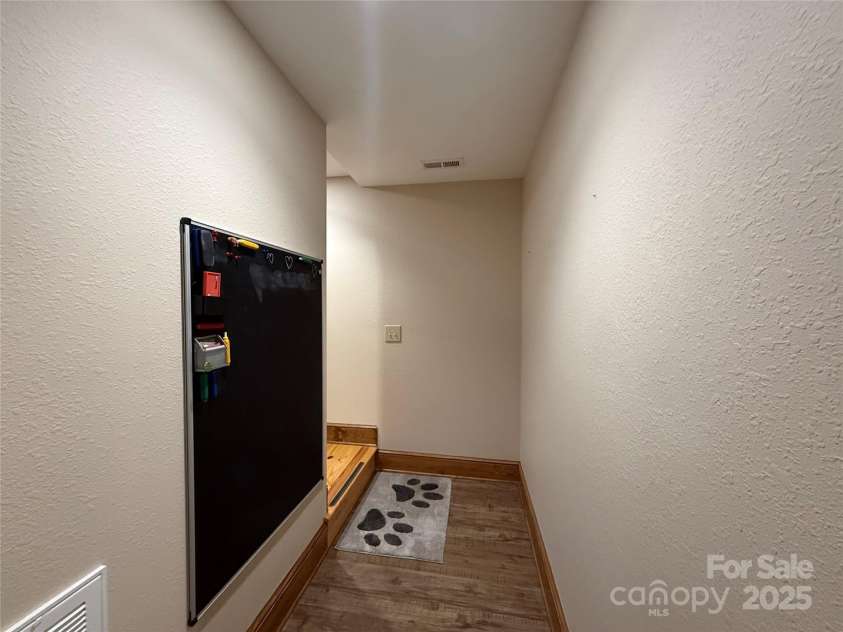 167 Rough Ridge Road, Sugar Mountain, NC 28604.  MLS# CAR4280706, YatesRealty ID 28505. Downstairs Chalk wall