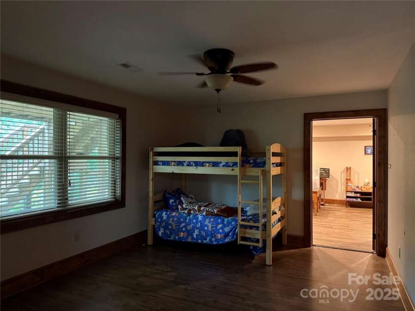 167 Rough Ridge Road, Sugar Mountain, NC 28604.  MLS# CAR4280706, YatesRealty ID 28505. Downstairs Den