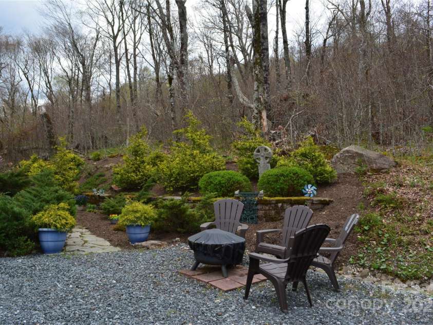 167 Rough Ridge Road, Sugar Mountain, NC 28604.  MLS# CAR4280706, YatesRealty ID 28505. Fire pit