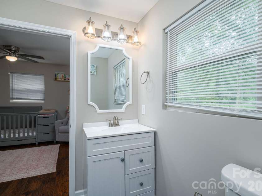 2002 Bill Lynch Road, Lincolnton, NC 28092.  MLS# CAR4384093, YatesRealty ID 28507. Front bathroom