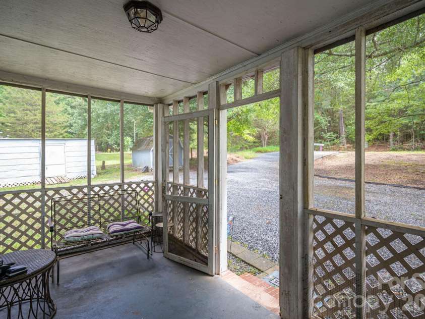 2002 Bill Lynch Road, Lincolnton, NC 28092.  MLS# CAR4384093, YatesRealty ID 28507. Screen porch